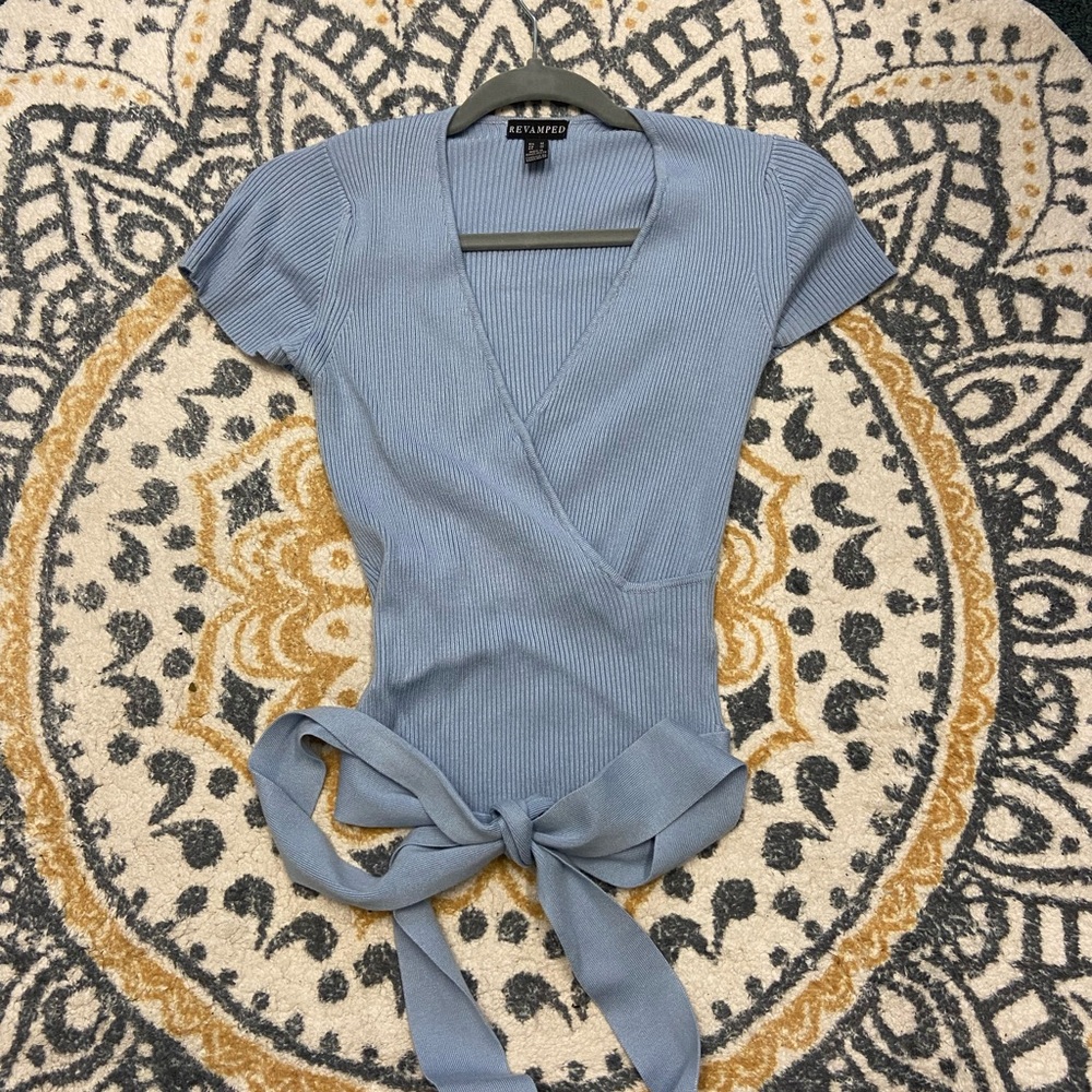 Light blue top